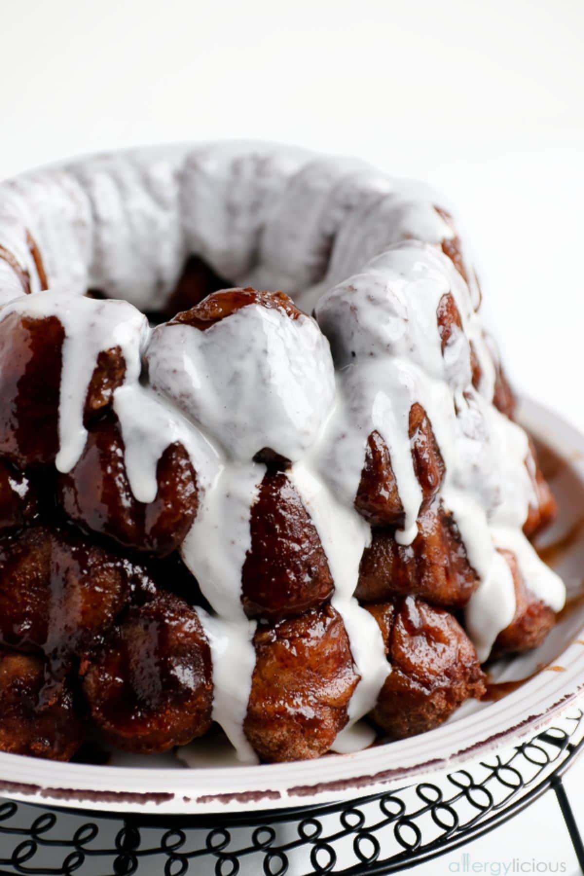 a plate holds an iced monkey bread