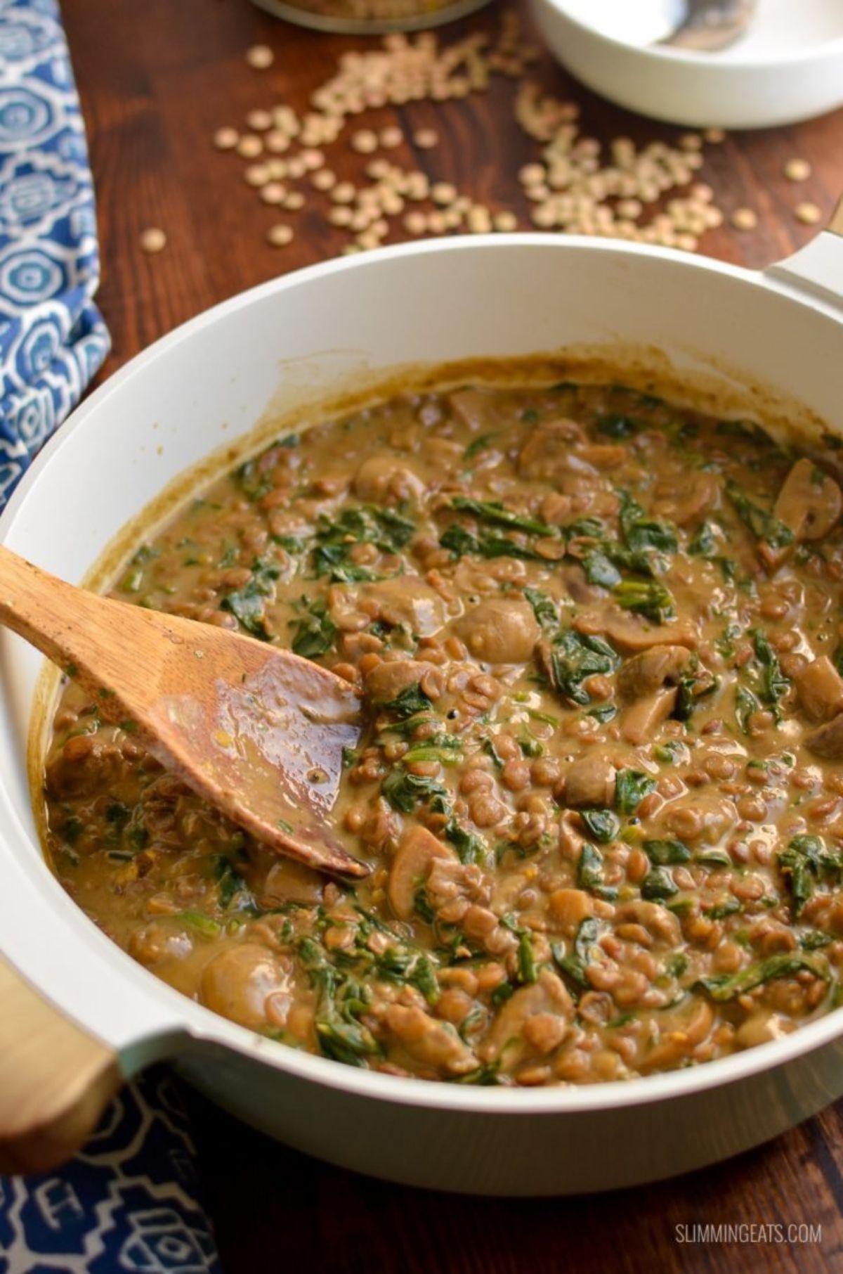 a casserole dish full of creamy coconut mushroom lentils