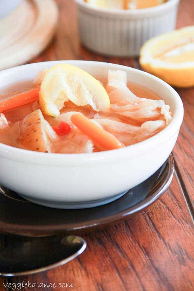 Caldo Soup with Cabbage Potatoes Chicken and Squeezed Lemon