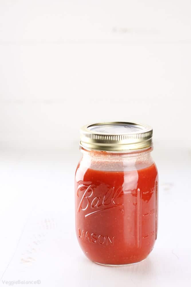 Homemade Buffalo Sauce in Mason Jar with white background