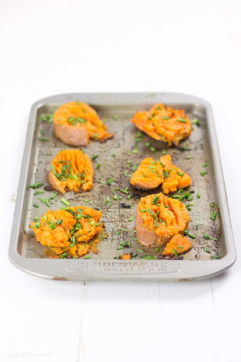 Smashed Sweet Potatoes drenched in garlic butter - Veggiebalance.com