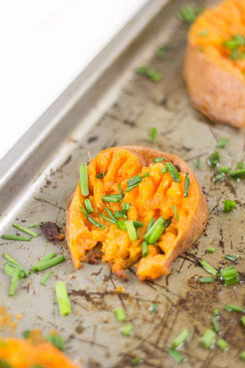 Smashed Sweet Potatoes drenched in garlic butter - Veggiebalance.com