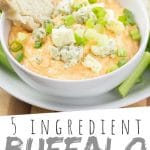 PINTEREST IMAGE with words "5 ingredient Buffalo Chicken Dip" Buffalo Chicken Dip with green onion and blue cheese crumble on top in a white bowl with a slice of bread sticking out.