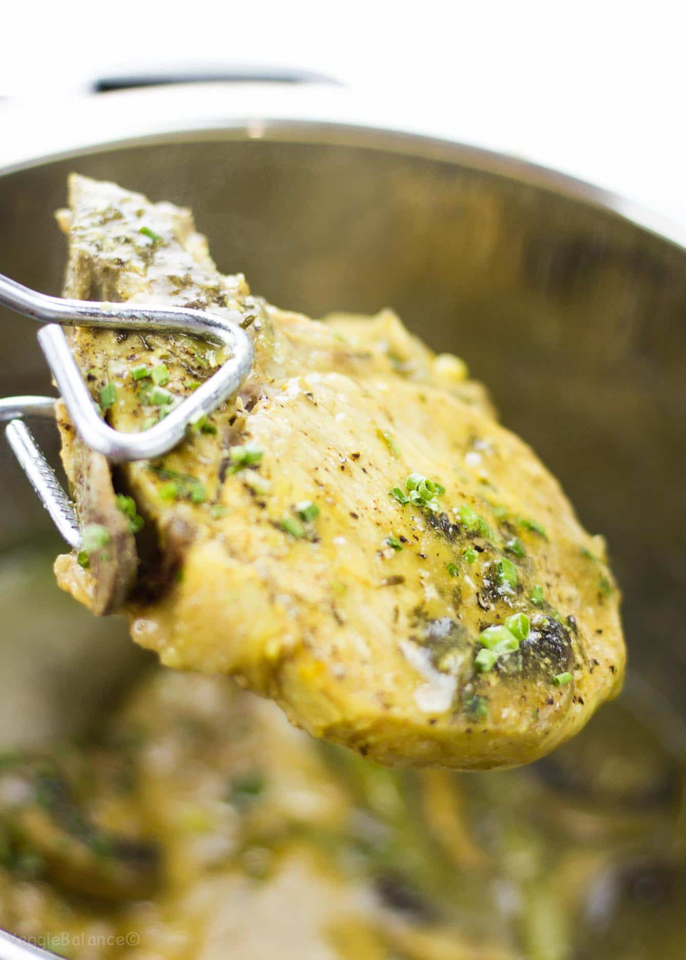 Pressure Cooker Pork Chops cooked in a honey mustard sauce.