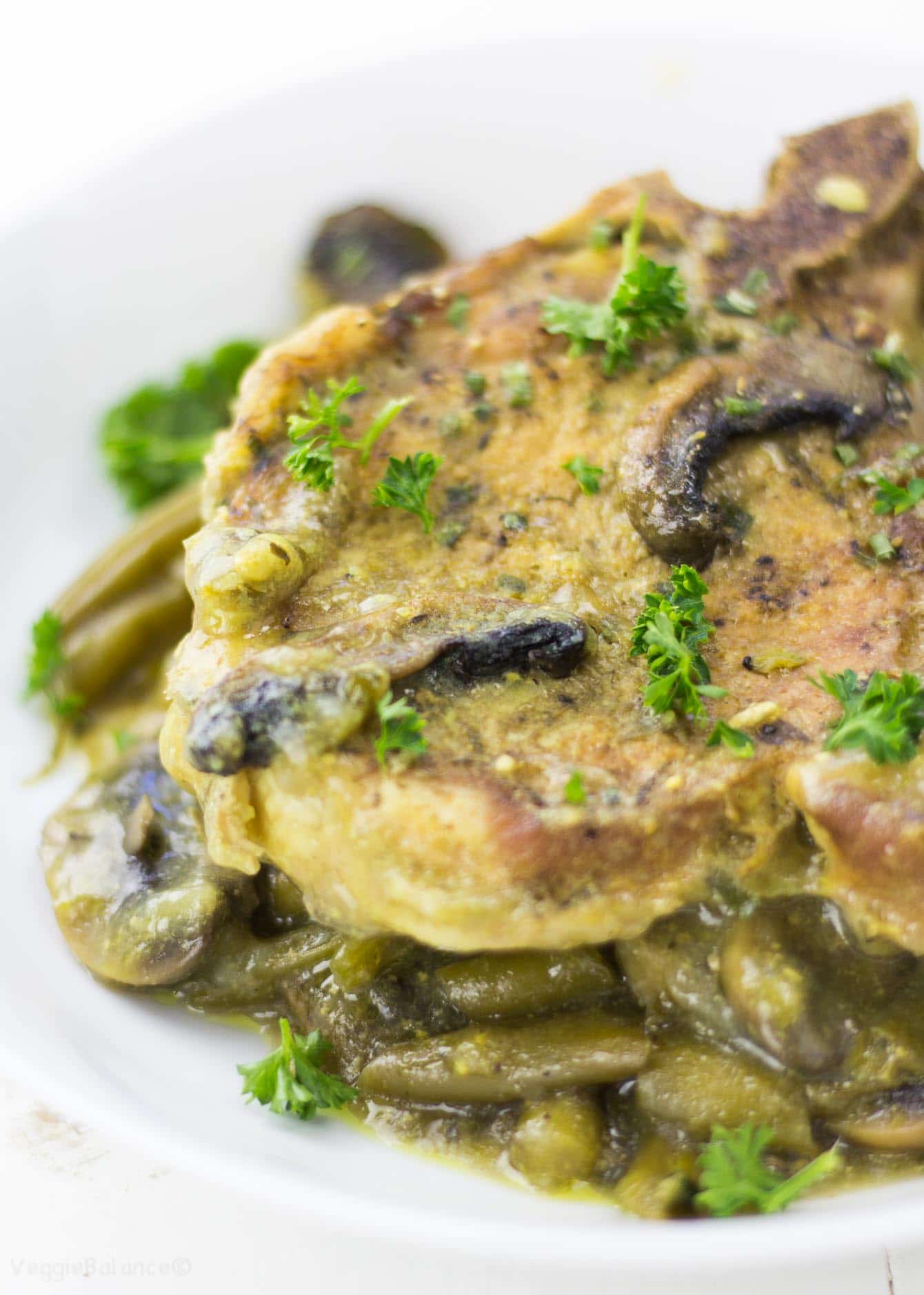 Pressure Cooker Pork Chops cooked in a honey mustard sauce. Enjoy the simplicity of 10 minutes of actual work and 30 minutes of hands-free cooking as the pressure cooker sizzles them to perfection.