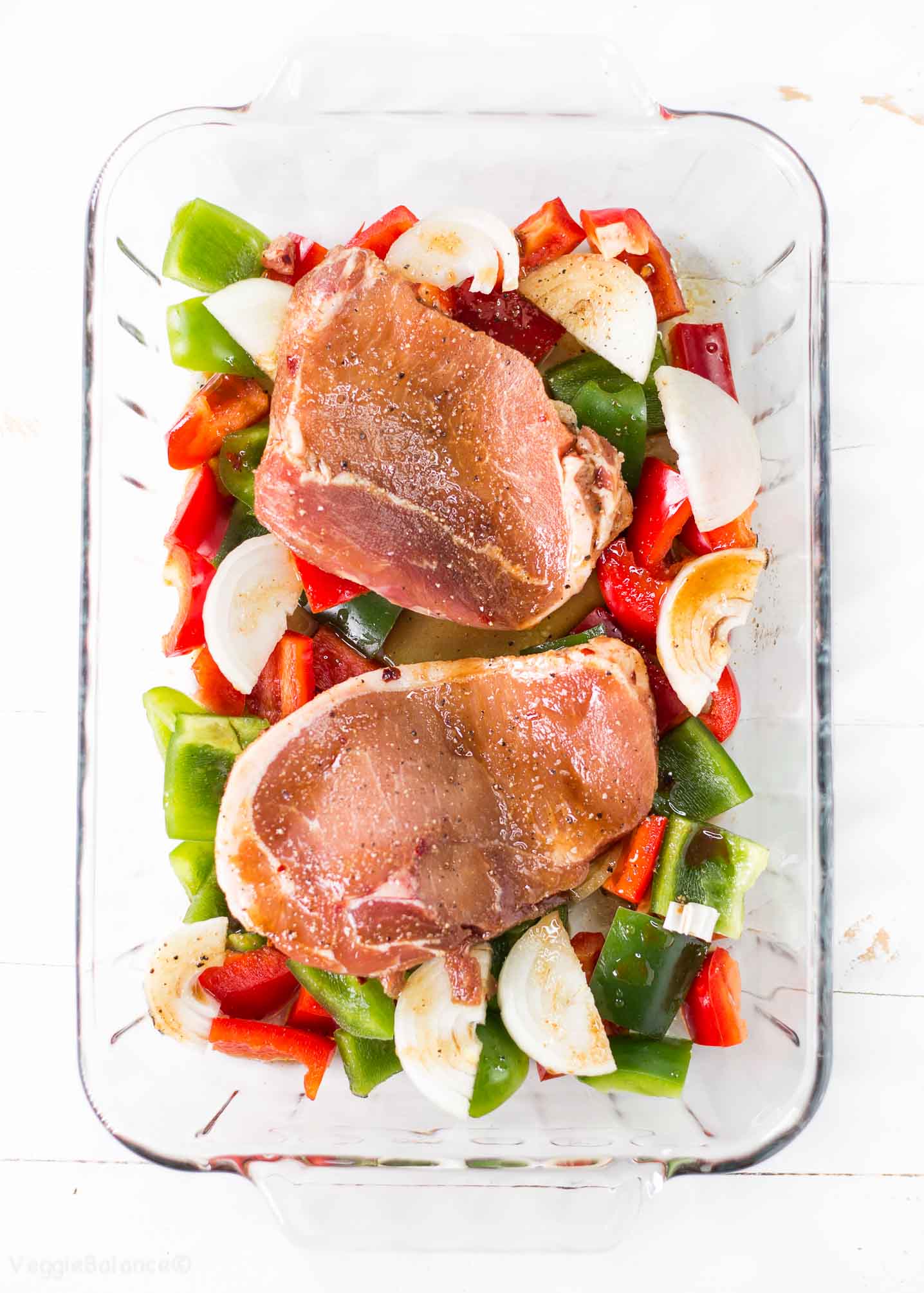 Oven Baked Pork Chops Smothered in Peppers