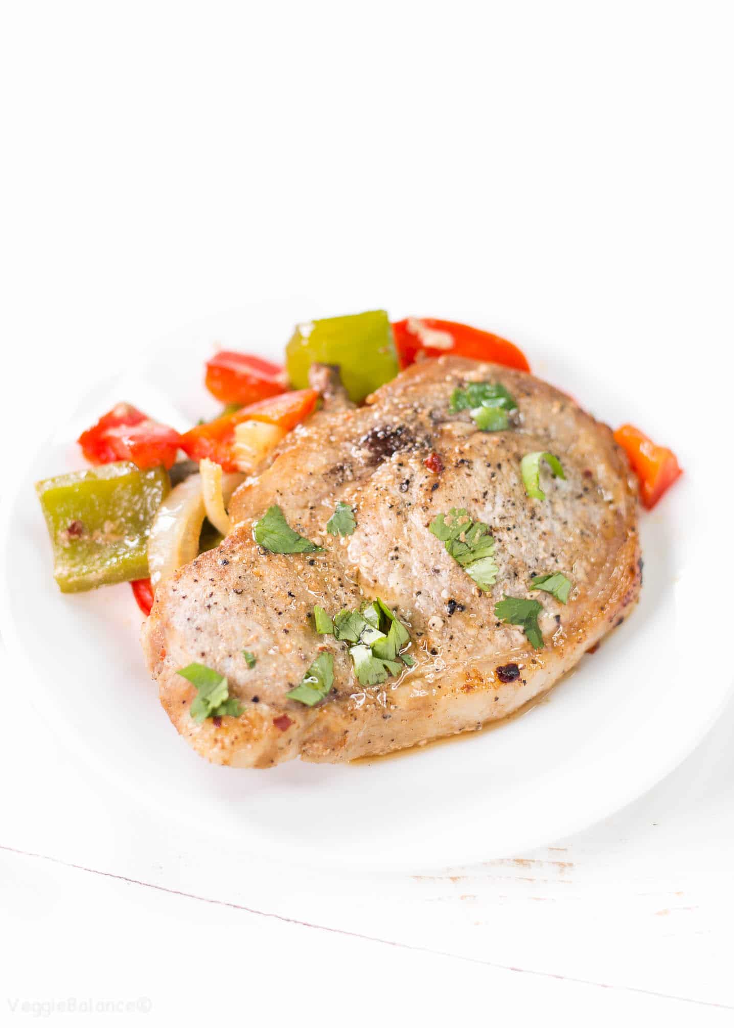 Oven Baked Pork Chops Smothered in Peppers