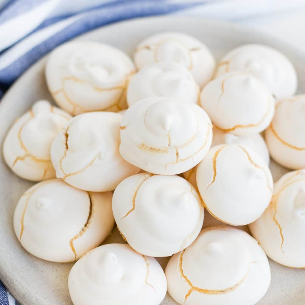 Meringue Vanilla Cookies piled on a plate