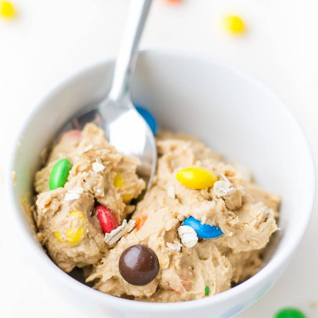 Edible Cookie Dough Monster Dip with M&M in a white bowl
