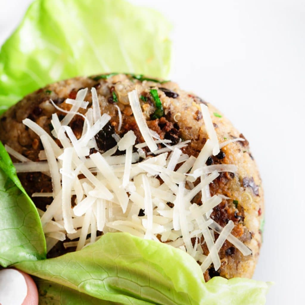 The Best Black Bean Burgers in a lettuce wrap with cheese
