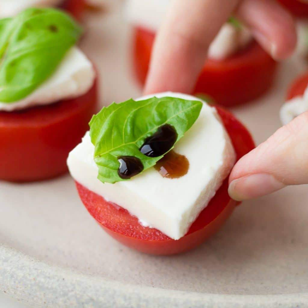 Easy Caprese Salad" Easy Caprese Salad tomato mozzarella and basil and red wine vinegar drizzled on top