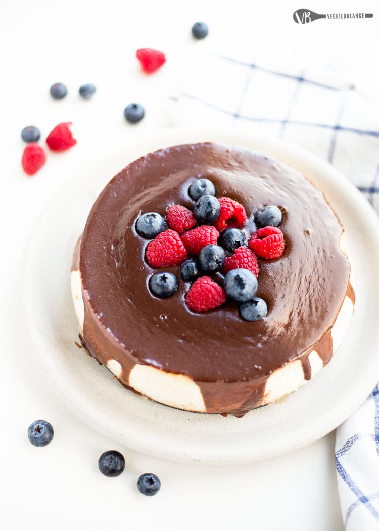 Gluten Free Cheesecake with chocolate and berries on top