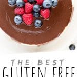 PINTEREST IMAGE with words "The Best Gluten Free Cheesecake" Gluten Free Cheesecake with chocolate and berries on top