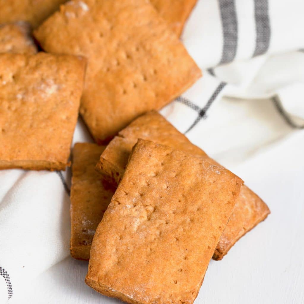 Gluten Free Digestives in a pile on a tea towel