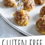 PINTEREST IMAGE with words "Gluten Free Meatballs" Gluten Free Meatballs with small forks sticking out the top on a white dish