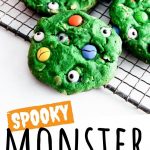 PINTEREST IMAGE with words "Spooky Monster Cookies" Halloween Monster Cookies green cookies with M&M's and eye candies on top