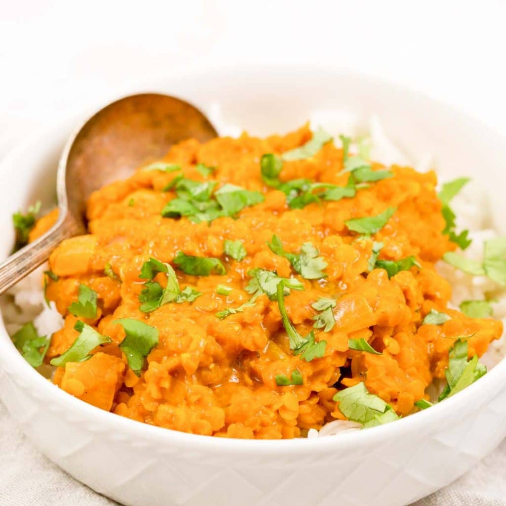 Instant Pot Lentil Curry in a white bowl