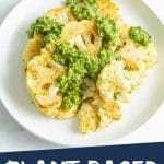 PINTEREST IMAGE with words "Plant Based Cauliflower Roasted Steaks" Cauliflower Roasted Steaks on a white plate