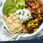 PINTEREST IMAGE with words "Plant Based Burrito Bowl" Overhead shot of Easy Vegan Burrito Bowl in a white bowl