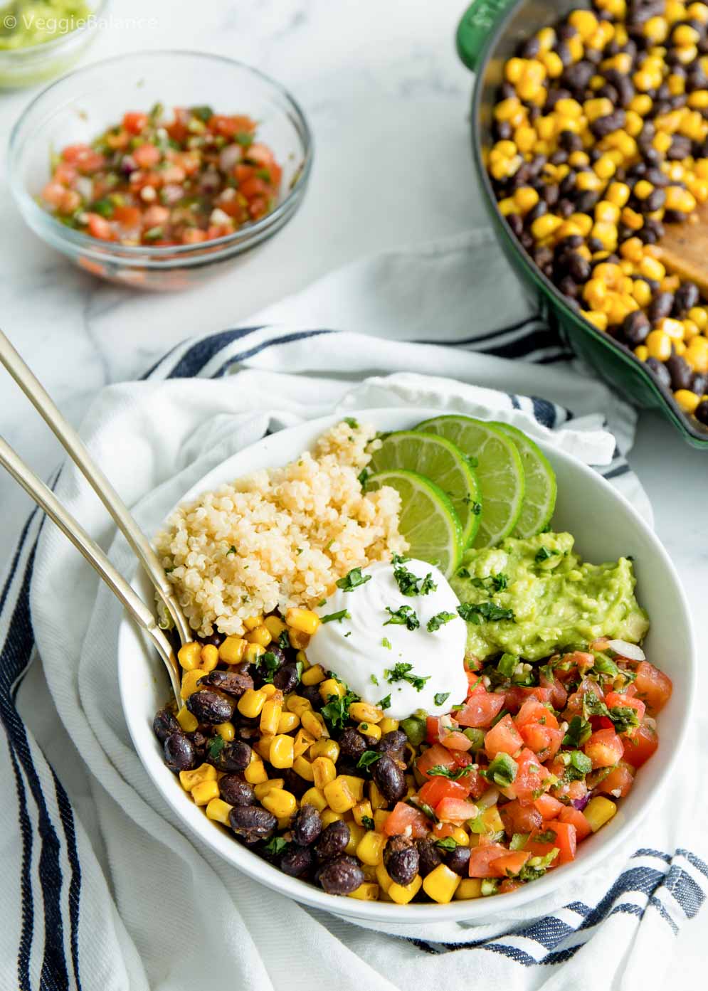 Easy Vegan Burrito Bowl built and with leftover pico de gallo and black bean mixture for extra meals