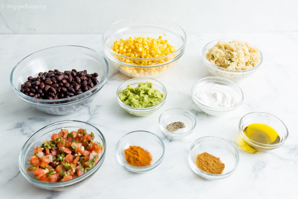 All the ingredients you'll need for our vegan burrito bowl: Black beans, Corn, Guacamole, Cilantro Lime Quinoa, Pico de gallo