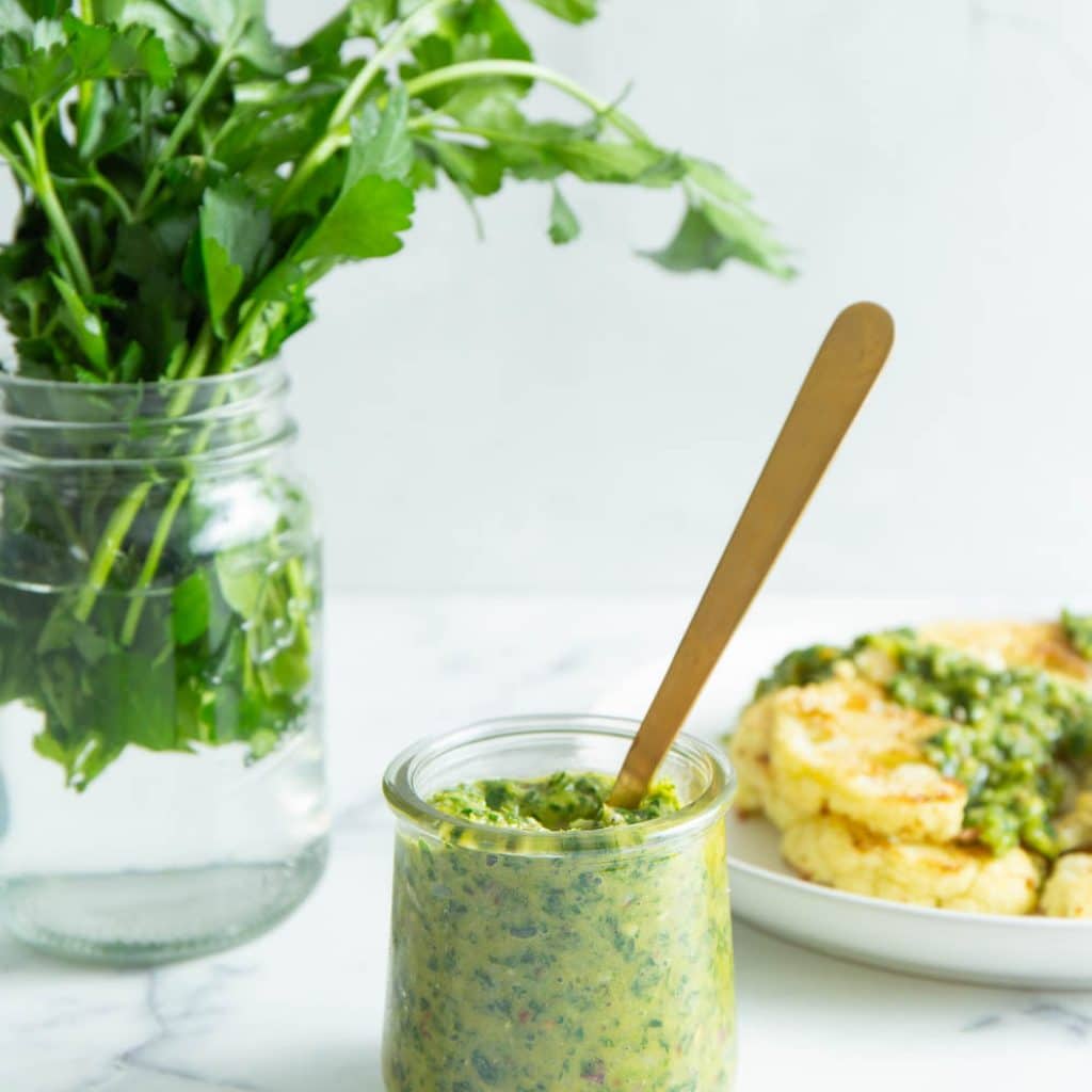 easy chimichurri sauce in a glass jar