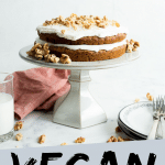 PINTEREST IMAGE with words "Vegan Carrot Cake" Vegetarian Carrot Cake on a white cake stand.