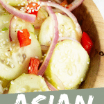 PINTEREST IMAGE with words "Asian Cucumber Salad" Image Asian Cucumber Salad in wooden bowl.