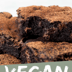 PINTEREST IMAGE with words "Vegan Brownies" Image of Easy Vegan Brownies piled with a bite taken out of one.