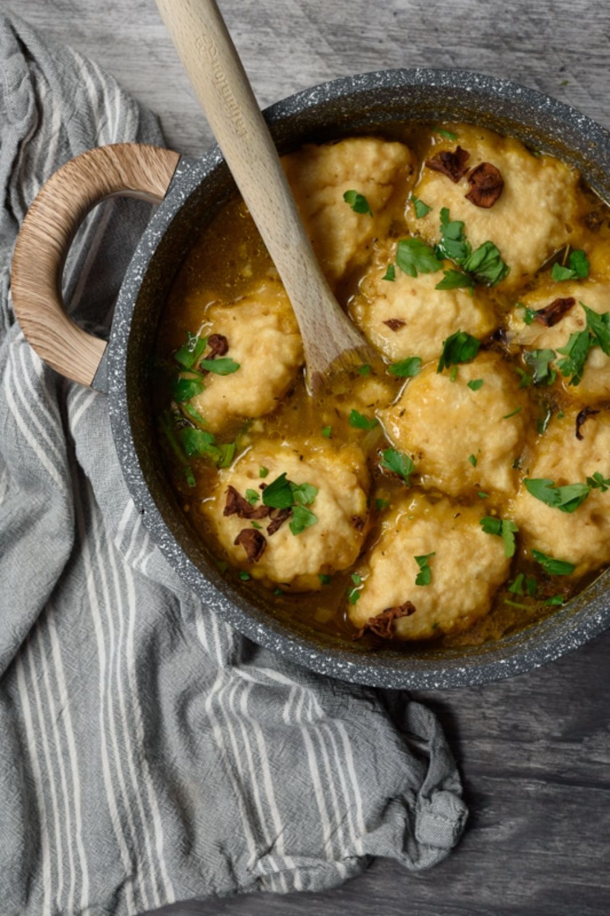 a dish full of vegan soup and dumplings