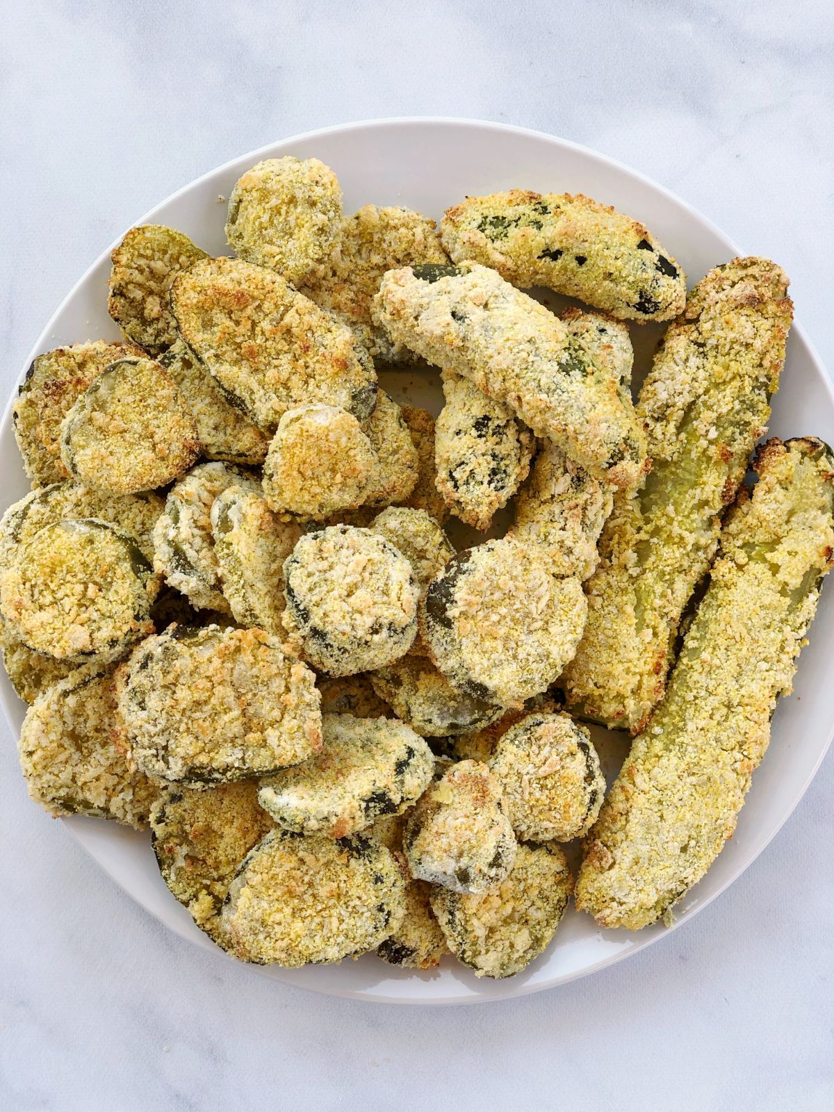 a top view of a plate of fried pickles