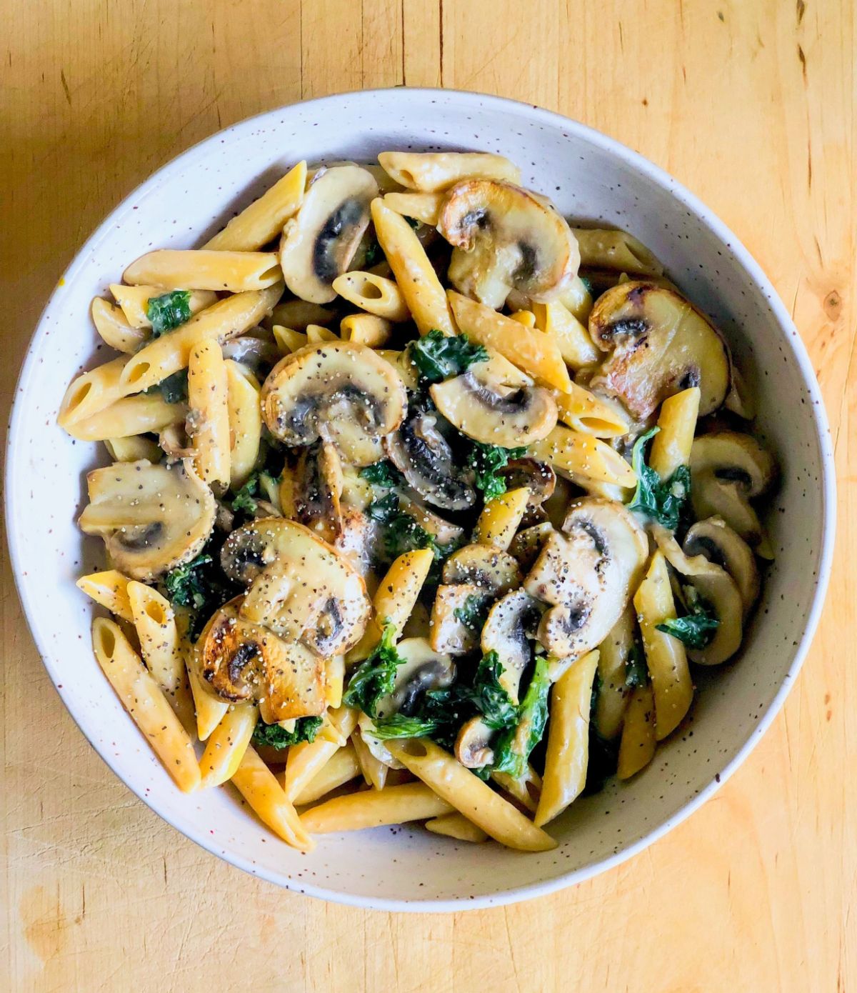 a bowl of creamy vegan mushroom pasta