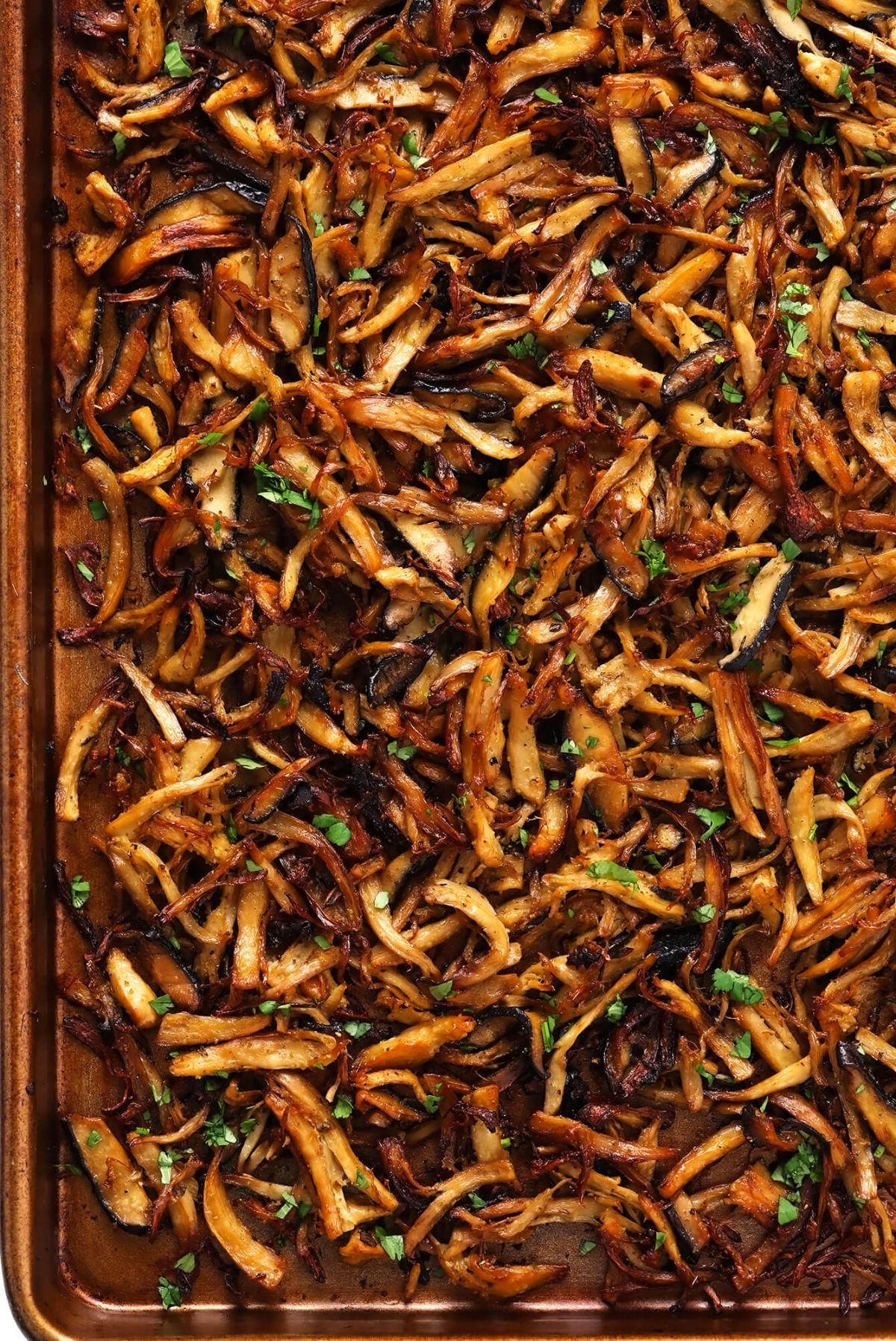 a roasting tray full of vegan mushroom carnitas