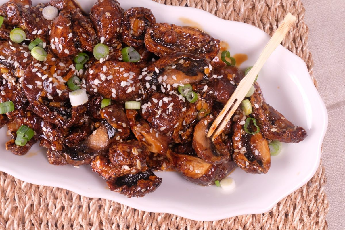 a dish of air fryer sesame shiitake mushrooms