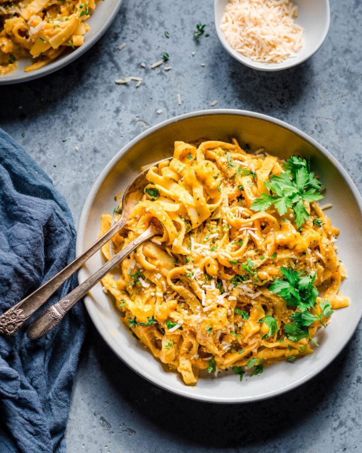 One-pot pumpkin vegan alfredo topped with fresh herbs